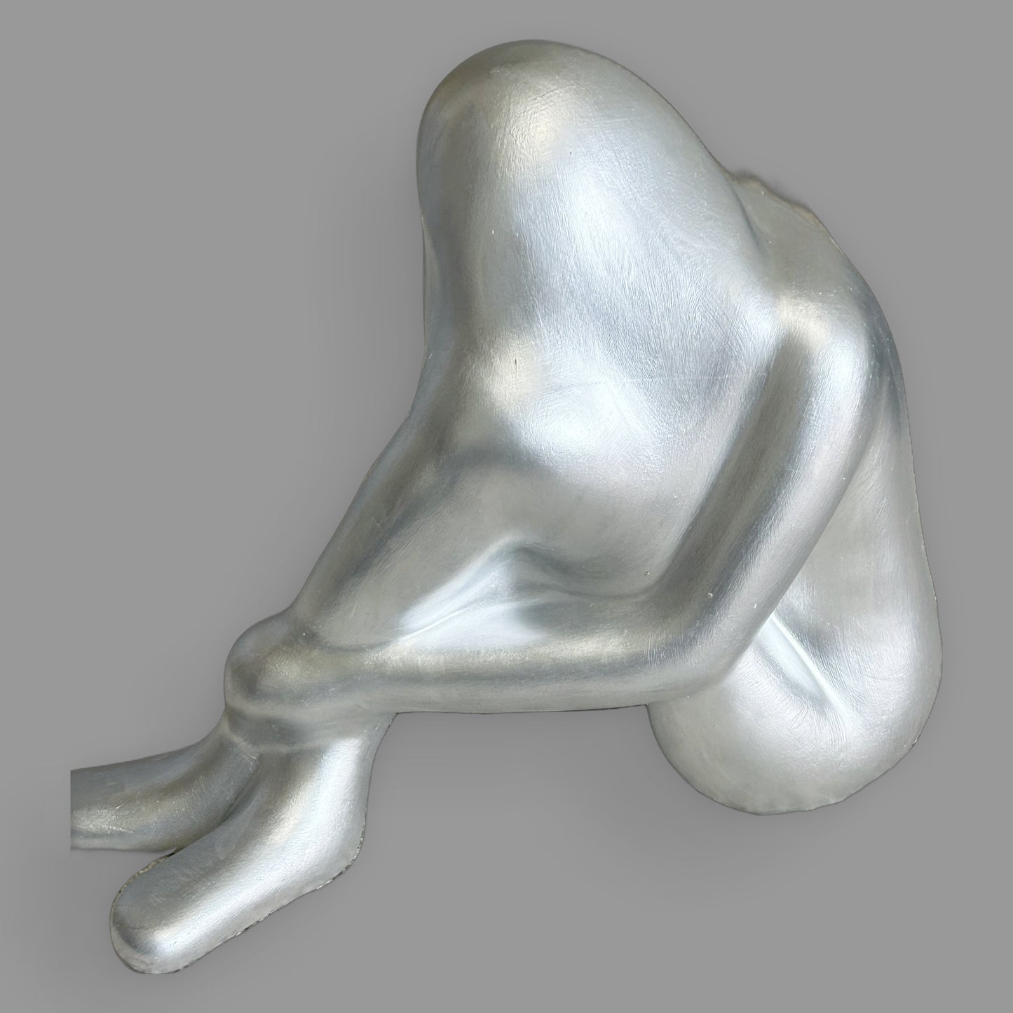 Silver Abstract Seated Figure Sculpture