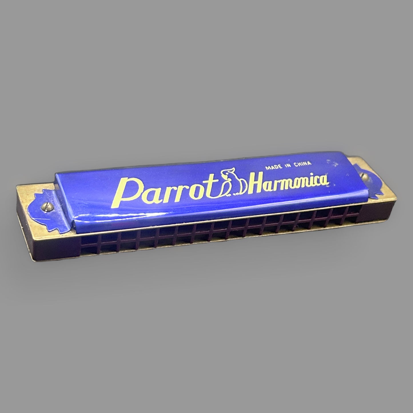 Vintage Blue Parrot 32-Hole Harmonica – Gold Accents